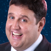 Peter Kay in front of night sky